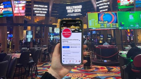 Cell phone with Hollywood's Facebook account on the casino floor.