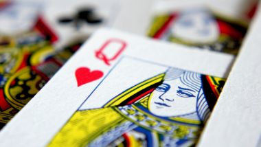 A Queen of hearts playing card
